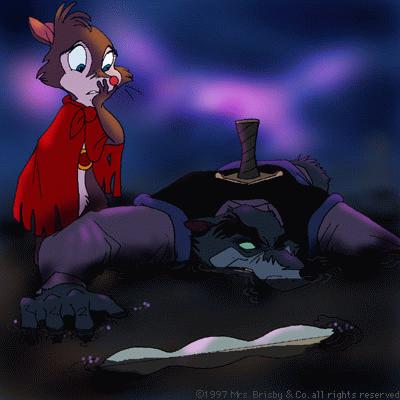 Flashback image of Jenner laying in the mud, face down with a knife plunged in his back. Mrs. Brisby watches with an agast expression.